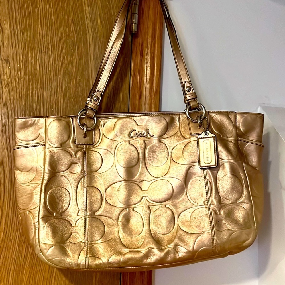 Metallic Gold Coach Bag…well used but in great condition. Satin lining/some pen